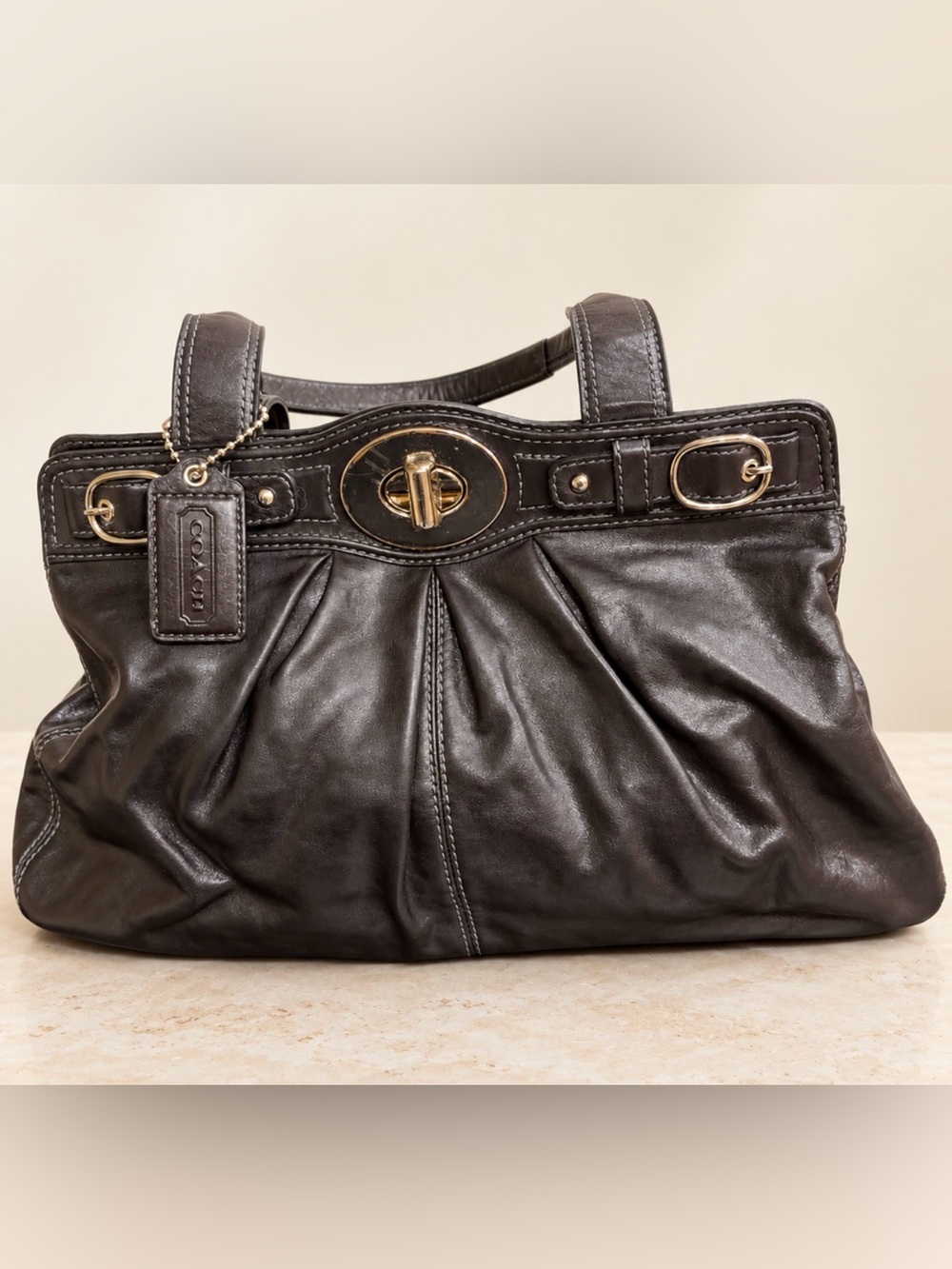 Coach Black Leather Pleated Satchel with silver 
Hardware